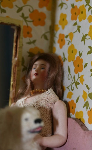 Surreal photo of a doll in interior scene